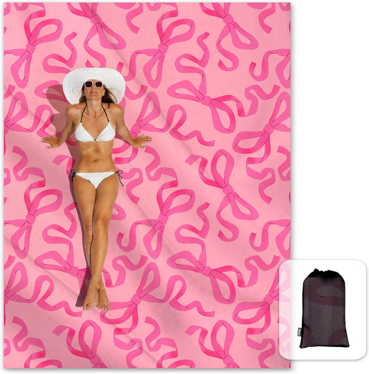 Sunlit Large Beach Blanket Waterproof Sand Proof, 81" x106" Sand Free Beach Mat Anchored Pockets and Storage Bag, for Travel Beach Camping Outdoor Festival, Coquette Pink Bow