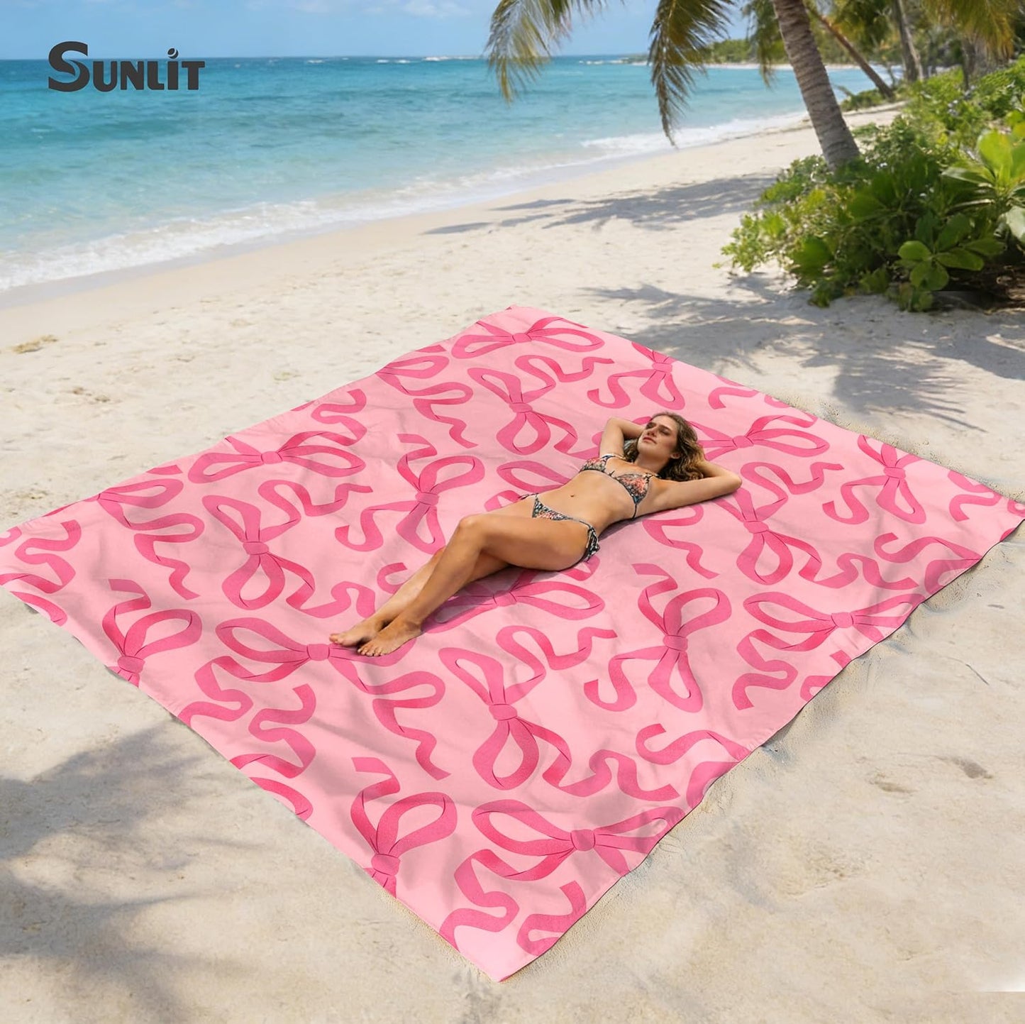 Sunlit Large Beach Blanket Waterproof Sand Proof, 81" x106" Sand Free Beach Mat Anchored Pockets and Storage Bag, for Travel Beach Camping Outdoor Festival, Coquette Pink Bow
